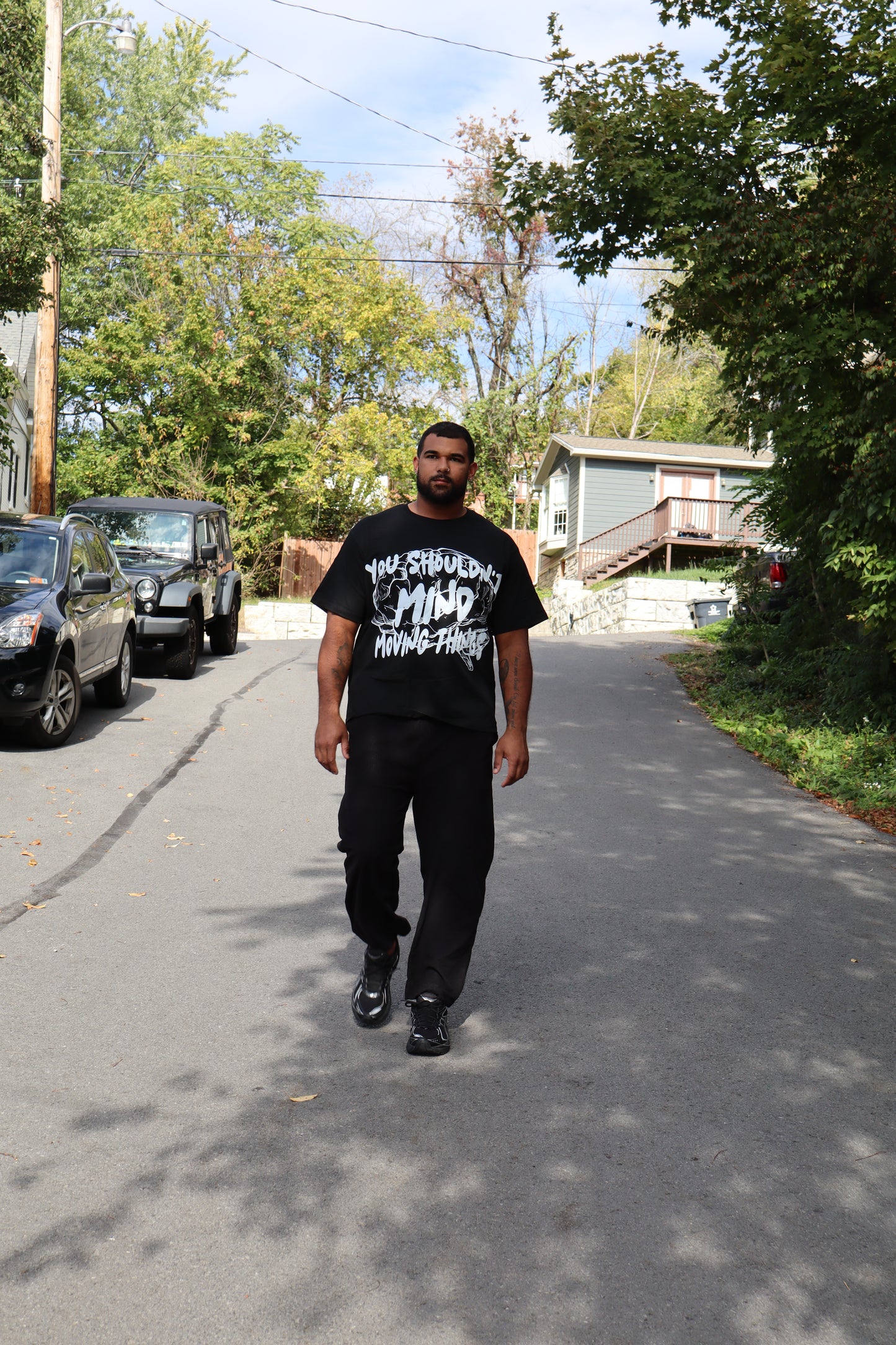 You shouldn’t mind moving things black Tshirt